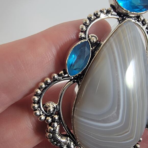 Handmade Silver Pendant Featuring Banded Agate & Five Faceted Blue Topaz Stones - Picture 9 of 10